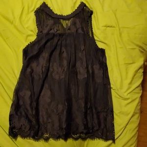 Tank top blouse with lace detailing.